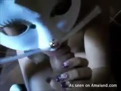 Delicious and breasty girlfriend in the mask sucks a schlong